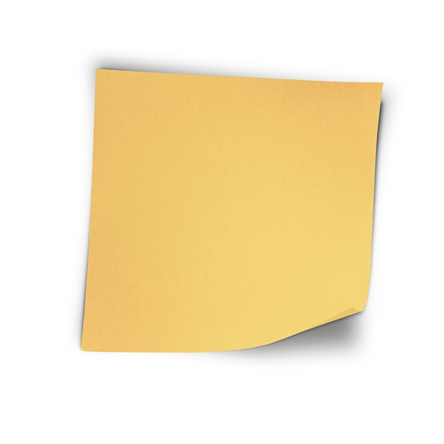 One yellow sticker on white isolated wall