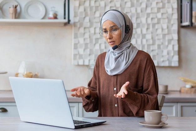 Online consultations a young muslim woman in a hijab a psychologist a psychiatrist in a hijab and a