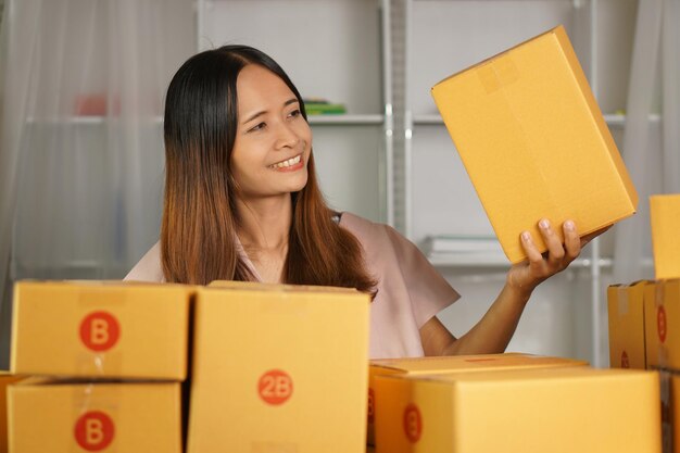 Online sellers check product boxes before delivering to customers