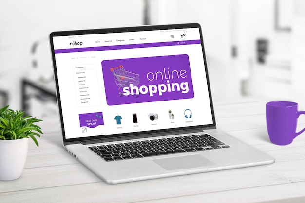 Online shop on laptop screen concept Modern ecommerce page with products and shopping cart