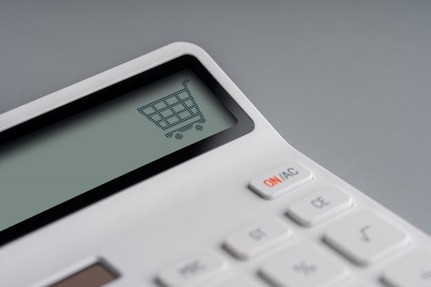 Online shopping and business icon on white calculator