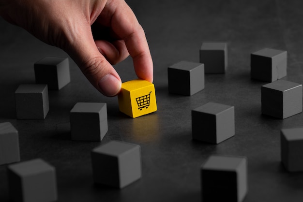 Online shopping icon on colorful puzzle cube