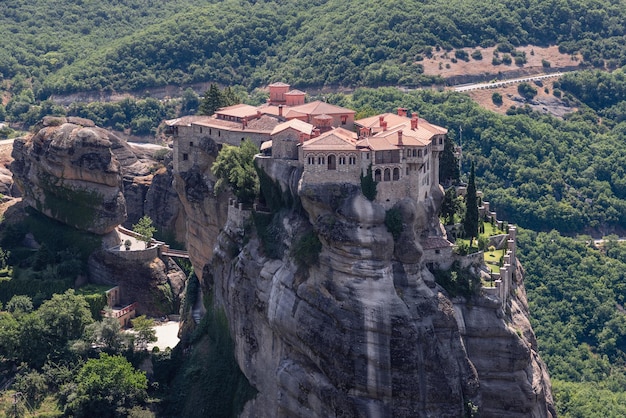 Only wooden narrow bridge over gorge to enter isolated Monastery of Varlaam in Meteora, Greece