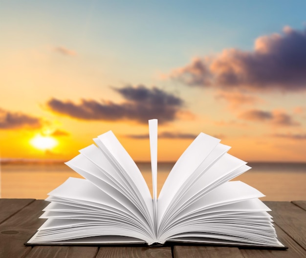 Open book on old wooden table