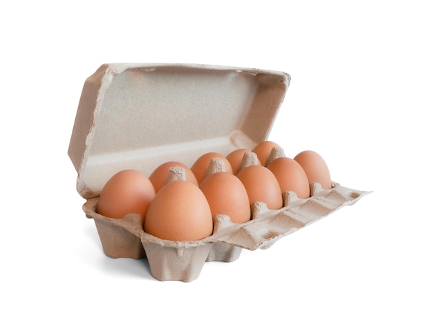 Open box with fresh brown eggs isolated on white background Fresh organic chicken eggs in carton box