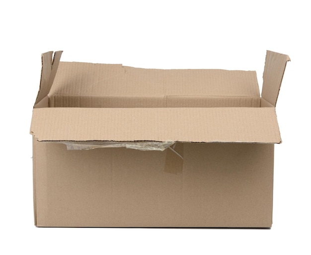 Photo open cardboard rectangular box made of corrugated brown paper isolated on a white background