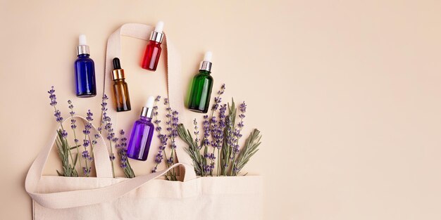 Open eco friendly cotton reusable bag with the different glass containers Natural lavender around