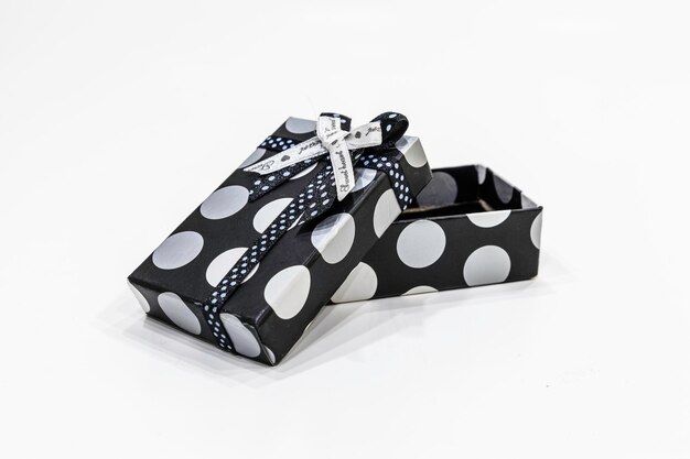 Open gift box with a ribbon isolated on a white background