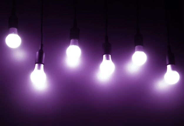 Open Light bulb on black backgroundadd purple color