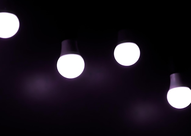 Open Light bulb on black backgroundadd purple color