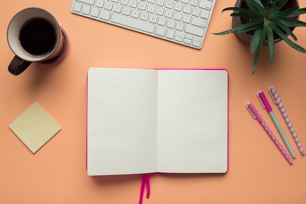 an open notebook page in an office desk table