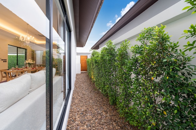 Open plan living area with sliding door and garden