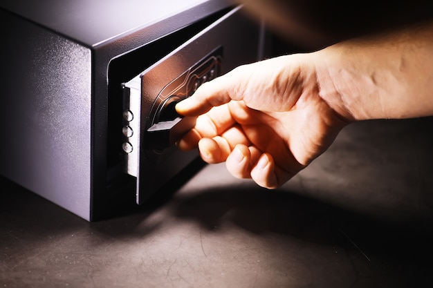 Open safe in a wealthy house. Safety box in hotel room. Concept safe storage of money and documents