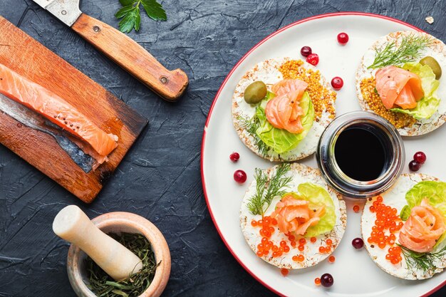 Open sandwiches with salmon and cream cheese.Bread with salmon fillet