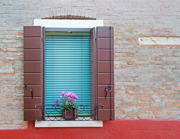 Open window in a rustic wall