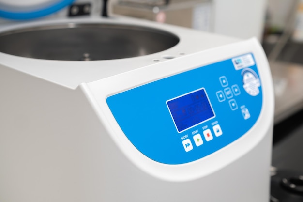 Opened centrifuge for sample preparation and phase separation in analytical or clinical laboratory