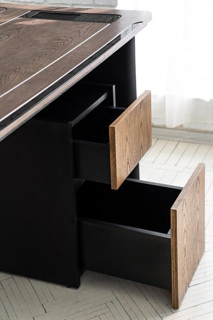 Opened drawer cabinet furniture wooden table at workplace