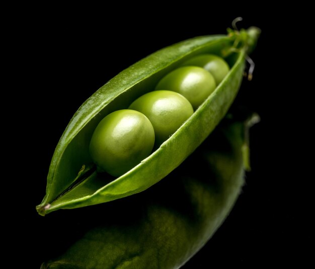 Opened green pea pods