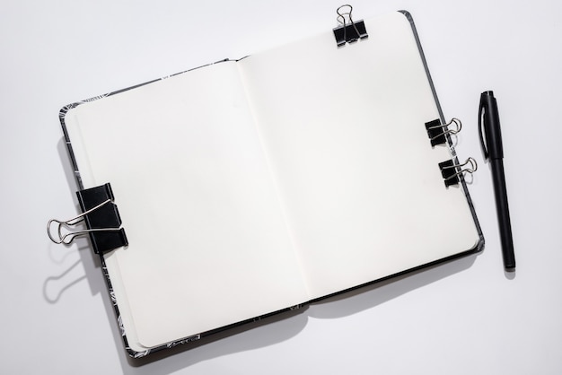 Opened notebook on white