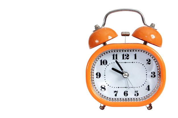 Orange alarm clock on a white background