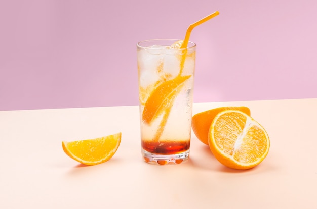 Orange alcohol cocktail with orange fruit slice