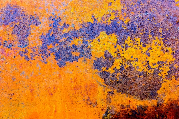 Orange blue color paint brush On the steel plate Rusty and rough for background