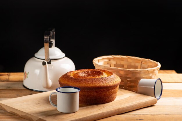 Orange cake beautiful orange cake and accessories on rustic wooden surface dark background selective focus