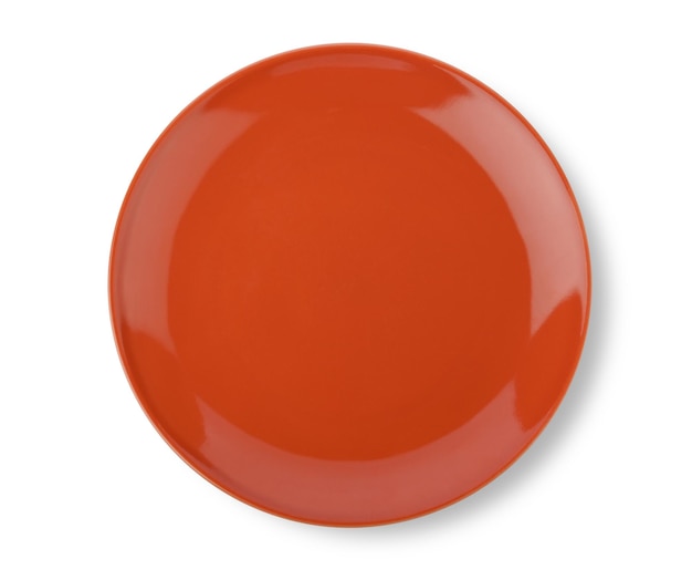 Orange ceramic plate isolated on white background Top view