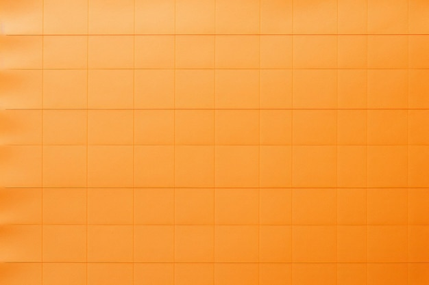 Orange chart paper background in a square grid pattern in the style of creased studyblr pontaven sch