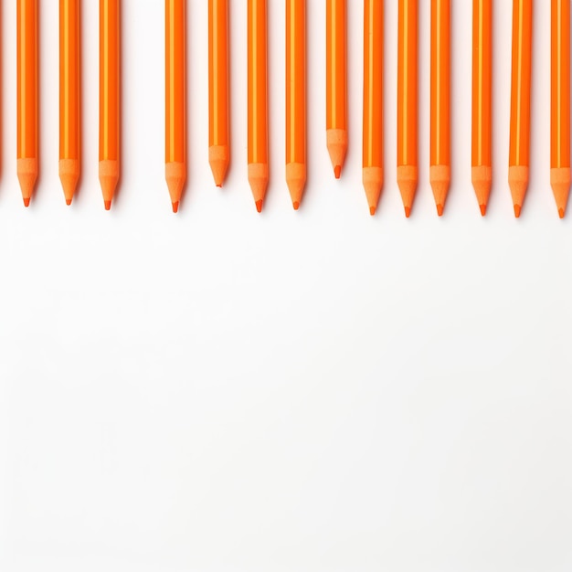 Photo orange crayon drawings on white background texture pattern with copy space for product design or tex