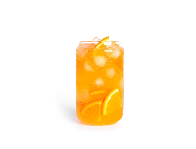 Orange drink with orange slices and ice in a glass isolated.