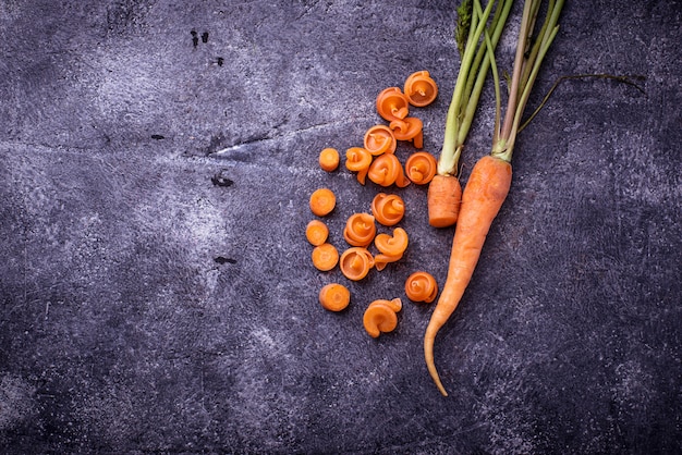 Orange dry pasta with carrot. Selective focus