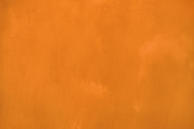 Orange grunge wall background texture