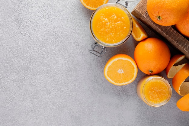 Orange jam in a jar made from fresh oranges.