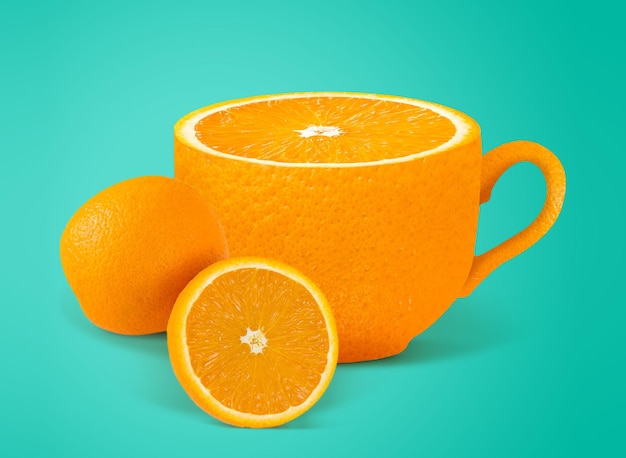 Orange juice creative concept for poster flyer banner Fresh orange juice or tea on green background