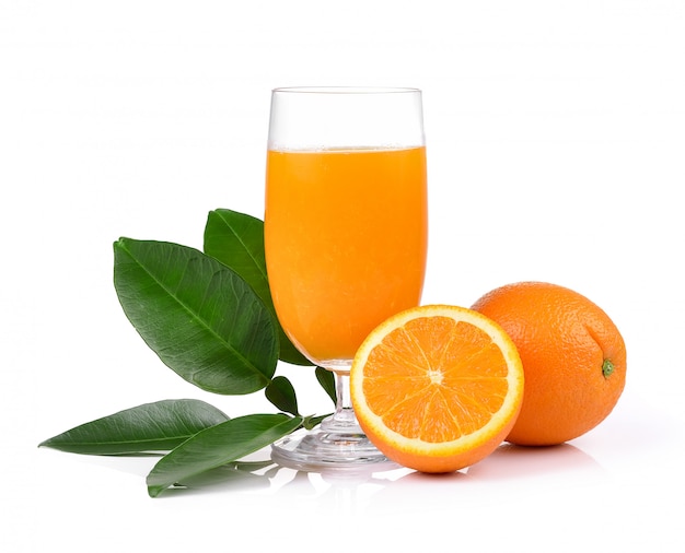 Orange juice and orange on white wall