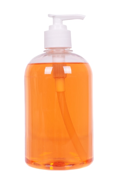 Orange liquid soap in a bottle, isolated on white space.