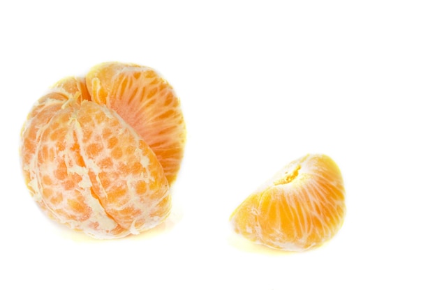 Orange mandarins  tangerine peel or mandarin slice isolated on white background Closeup photos of fresh citrus fruit