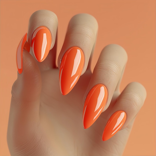 Orange nail polish on manicured nails