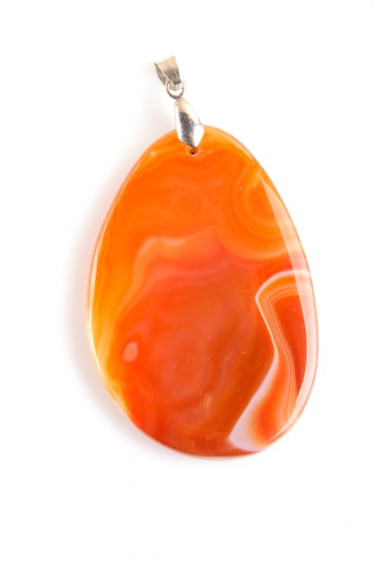 Orange onyx pendant isolated on white surface