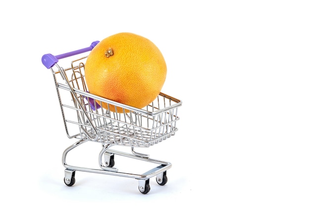 Orange orange in a supermarket trolley on a white 