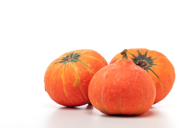 Orange pumpkin on white background