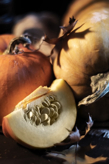 Orange pumpkins on the table, autumn still life