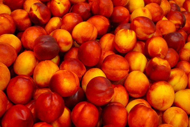 Orange and red ripe nectarines.