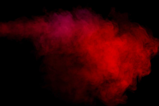 Orange and red steam on a black background