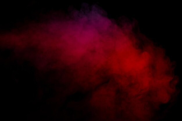 Orange and red steam on a black background