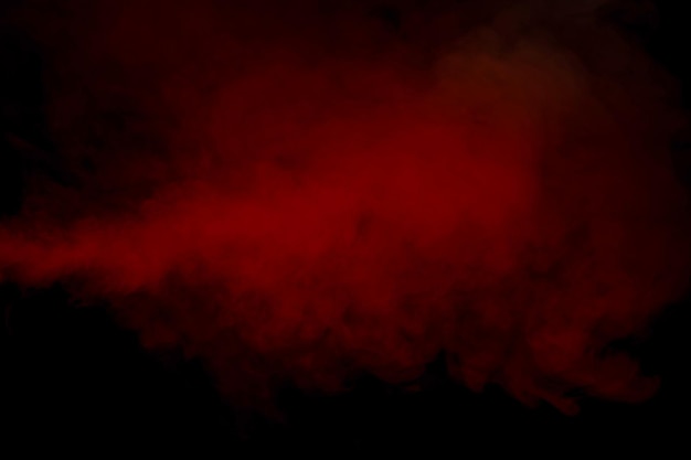 Orange and red steam on a black background