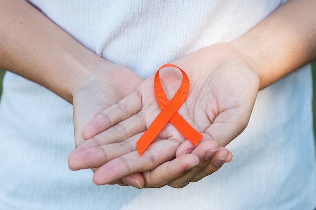 orange ribbon for leukemia, kidney cancer and multiple sclerosis awareness