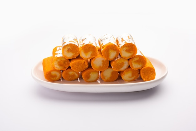 Orange Roll barfee or barfi sweet or Mitlai