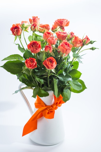 Orange roses in vase